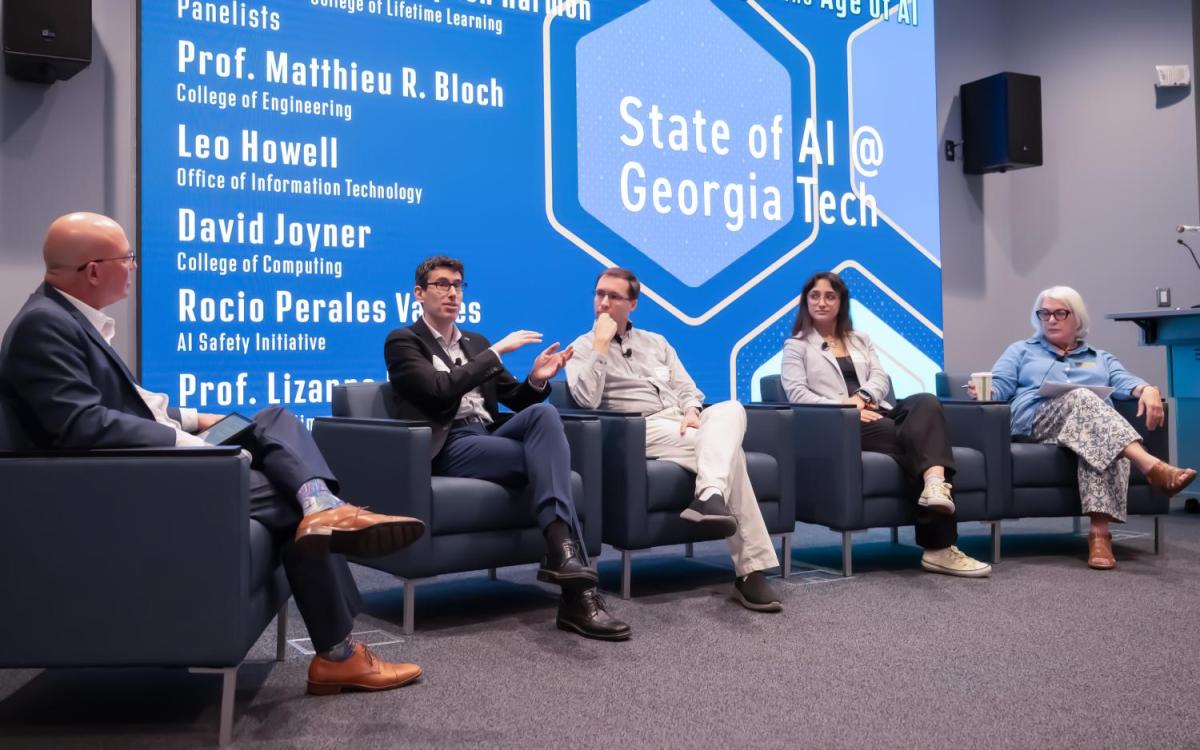 Harmon, Bloch, Joyner, Perales Valdes, and DeStefanno during a panel presentation.